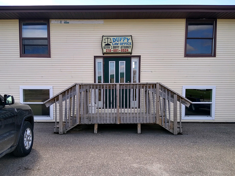 duffy-law-office-building-exterior Exterior entrance of Duffy Law Office featuring the office sign for Kevin T. Duffy Attorney and phone number 218-681-8524 in Thief River Falls, Minnesota.